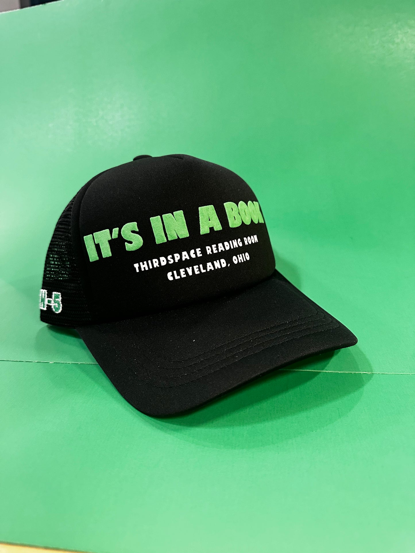 “It’s In A Book” Trucker Hat